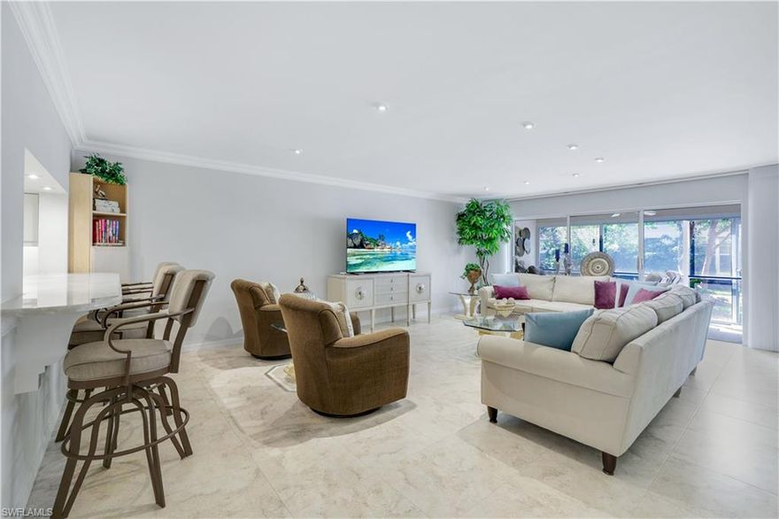 Welcome home to your private oasis, which boasts views of lush tropical foliage. Relax on your lanai and feel as though you are on vacation every day! This spacious floor plan offers open concept living, three bedrooms, a dining room/den, and two full baths. This residence has been thoughtfully updated with tile flooring in the main living areas, remodeled kitchen with shaker cabinets, modern bathrooms, new electrical panel, new piping throughout, and neutral paint colors! This unit may be sold turnkey furnished if desired. Pelican Bay is one of Naples' most prestigious and sought after, amenity-rich communities. Walk the Pelican Bay nature path amidst protected mangroves, taking in the natural wildlife, or use the provided golf cart trams to escort you to either of the two private beach clubs. Both clubs offer beach attendant services, loungers, umbrellas, cabanas, sailboats, kayaks, paddle boards, and formal and open-air restaurants with a robust live entertainment schedule. Fitness enthusiasts can also enjoy canoeing through the mangrove preserves, an indoor and outdoor full-service gym with cardio and new strength training equipment, a variety of group fitness classes including beachfront options and yoga, a lakeside wellness studio, and two tennis centers with 18 Har-Tru courts, pro shops, plus the new state of the art racquets facility for pickleball and tennis. If you enjoy book clubs, games, art classes, speaker series, and other social events, the activities director has something for everyone. Start living your best Naples life today!