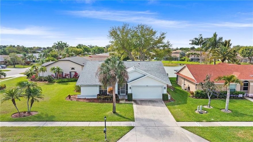 One or more photo(s) has been virtually staged, AI generated or rendered.  RARE OPPORTUNITY! North Naples – Priced to Sell in Regent Park. Exceptional opportunity to own a 3-bedroom, 2-bath single-family home in the highly sought-after Regent Park community of North Naples, priced under $500,000. Situated on an oversized corner lot with a peaceful partial lake view, this property offers a tranquil setting with mature landscaping and wonderful potential. The home features a new roof installed in 2017 and presents an excellent opportunity for buyers to update and customize the interior to their own style. With a desirable floor plan and generous lot size, this residence offers the perfect canvas to create your ideal Naples retreat. Regent Park is a quiet, well-established neighborhood in the heart of North Naples, ideally located approximately 3 miles to the Gulf beaches and Delnor-Wiggins Pass State Park. Residents enjoy easy access to Mercato, Waterside Shops, dining, shopping, and entertainment. The home is also located within the highly desirable school zones of Pelican Marsh Elementary, North Naples Middle School, and Aubrey Rogers High School. Priced to sell, this property represents a rare opportunity to own a single-family home in one of North Naples’ most convenient and desirable locations. Photos have been virtually staged to show the full potential of this property.