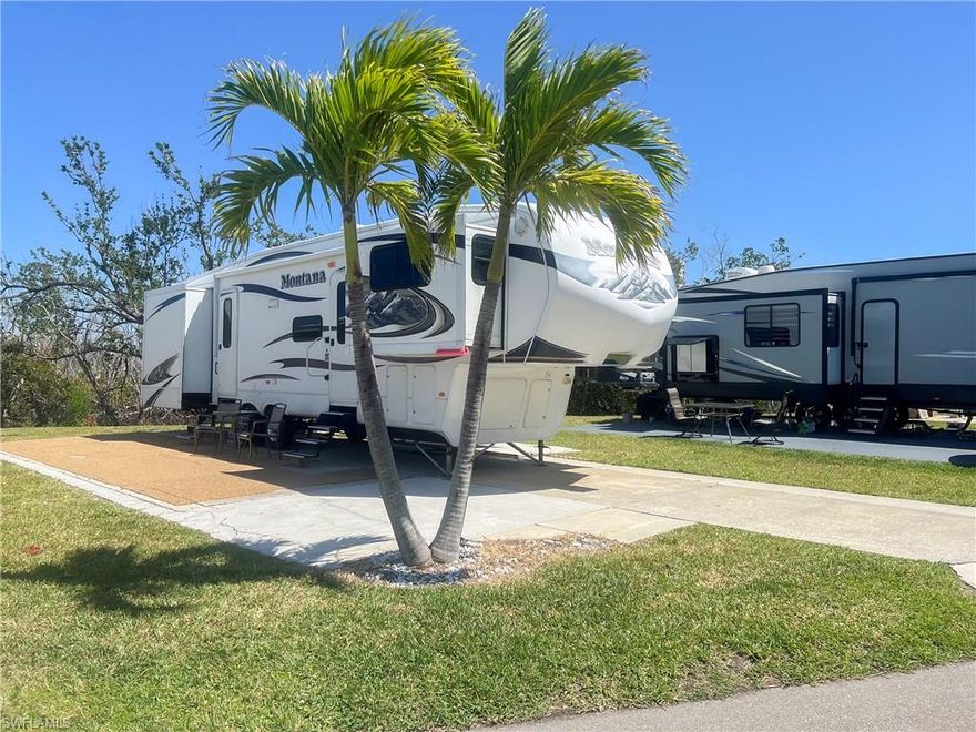 This property is PET FRIENDLY, 62' deep and perfect for those seeking a serene lifestyle with easy access to all SW Florida has to offer! Water, Sewer and 50 AMP ELECTRIC restored. Enjoy sunny, warm days from this very desirable private lot that backs up to the mangroves.  Park your RV or build your new manufactured, or tiny home. Palmetto Palms is a 55+ community offering Boat Storage and is biking or walking distance to Bunche Beach. So close to Fort Myers Beach and Sanibel Island, with endless opportunities for boating, beach outings, dining, and so much more. Embrace the SW Florida tropical lifestyle at Palmetto Palms.