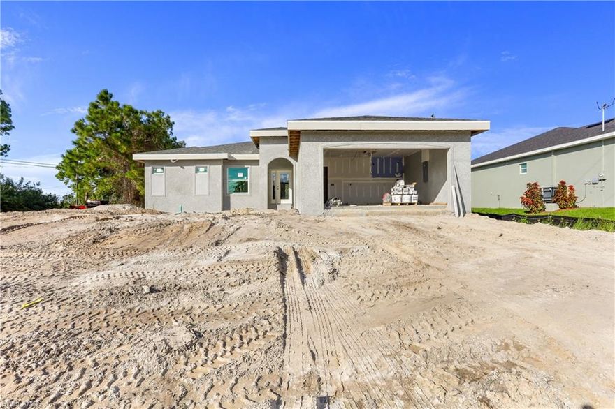 DON'T WAIT!! **Complete by March 2021** Prime Location!  Welcome to NW of Cape Coral, one of the fastest growing areas in the beautiful city of Cape Coral !! This wonderful modern open floor plan concept brand new  Single Family Home "Paradise model" features nearly  1,700 Sq. Ft of living space, 3  bedroom plus den,  2 Full  new bathrooms with Quartz, 2 car garage . Freshly painted inside and out, epoxy in garage, new kitchen with soft-close cabinets, Quartz counter tops, island, new stainless steel appliances, new doors, new based boards,  new  AC system, new light fixtures, new plumbing, new smoke detectors, alarm system new water heater, new well equipment. Home is equipped with Taex built-in pest control system, irrigation system, hurricane impact doors and windows, laundry room,  Spacious master bedroom, new master bath, double-sink, 1 huge walk-in closet, new plank tile throughout the home. The location is close to many of Cape Coral top schools, closer to US 41, North Fort Myers, hospitals,  shopping, dining, entertainment & less than 30 mins to SW Florida International Airport, NO HOA Fees.This home will not last! Renderings photos