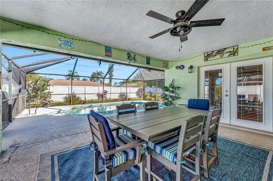 Welcome to relaxed Florida living at **2203 SE 1st Ter in Cape Coral**—a home designed for comfort, entertaining, and everyday ease.

This **3-bedroom, 2-bath residence with a 1-car garage** sits on a generously sized lot with a **fully fenced yard**, offering privacy and plenty of room to enjoy the outdoors. Picture evenings gathered around the **fire pit**, sunny afternoons in your own **sandy beach-style area**, and weekends spent unwinding on the **large under-truss lanai**, perfect for shaded lounging or outdoor dining year-round.

Inside, the home feels fresh and inviting with a **newly updated kitchen** that serves as the heart of the home, ideal for casual meals or hosting friends. **Impact windows** add peace of mind and energy efficiency, while the **laundry located inside the residence** adds everyday convenience.

The **oversized primary suite** is a true retreat, featuring a **large walk-in closet** and space to recharge after a long day. Two additional bedrooms offer flexibility for guests, family, or a home office.

Located in a well-established Southeast Cape Coral neighborhood, you’re just minutes from **shopping, dining, parks, and waterfront recreation**, with quick access to major roads for easy commuting. The area is served by **Lee County schools**, and nearby options include public, charter, and private schools. Best of all, you’re a short drive to **Southwest Florida’s beaches**, marinas, and all the lifestyle amenities that make this area so desirable.

If you’re looking for a home that supports indoor comfort and outdoor living, this one delivers the space, features, and setting to truly enjoy the Cape Coral way of life.