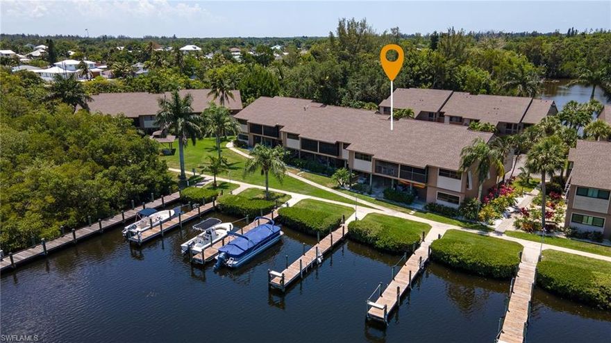 Here is an opportunity to own one of the best waterfront units in one of the best condos on Pine Island. The gorgeous views are across the water towards mangroves and plenty of birds. Check it out in the photos. Captains Harbor has recently refurbished boat docks, new roofs, and large reserves. Captain’s Harbor has a 50’ boat dock for each unit at no additional cost, a swimming pool, and two tennis/pickle ball courts. Live the Captain’s Harbor lifestyle, with quick deep access to Charlotte Harbor and the Gulf of Mexico. You are minutes by boat from the unspoiled beaches of Cayo Costa, the funky “Cheeseburger in Paradise” vibe of Cabbage Key and the fantastic tarpon fishing of Boca Grande Pass. You can be offshore in minutes for snapper, grouper, tuna, or mahi-mahi -- or fish the backwaters for snook, sea trout, and redfish. Field & Stream magazine calls the area around our island one of the 10 best fishing spots in the world! Some people work all year to get a week in this wonderful area, and now you can live here! Be sure to check out the virtual tour for a video walk-thru of the house.
