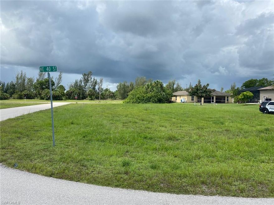 This is a corner lot with excellent location close to the Island Coast High School, shopping and parks. Build your dream home in this neighborhood. Lot is only with grass and there's no trees to cut or special requirements to build. This is an excellent opportunity due to low financial rates. Buyer to assume any and all future utility assessments.