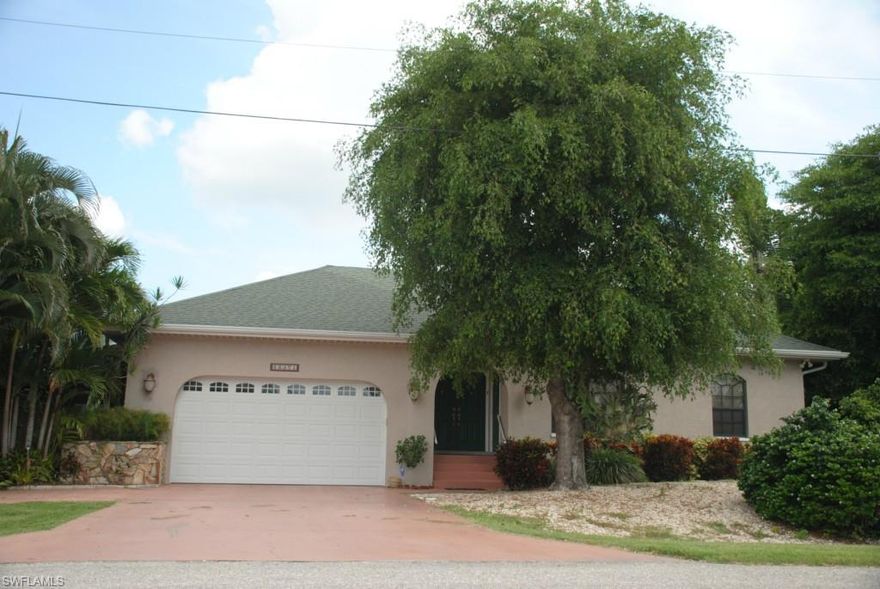 Looking for one of the best deals in one of the best areas in South West Florida? This home is literally within minutes to Fort Myers Beach, Sanibel, and some of the finest restaurants , shopping and local favorites in the area. Convenient to I-75 makes this an easy destination from the airport with a traveling time of 25 to 30 minutes. This 2667 square ft. home has all the upgrades already in place with granite counters, stainless appliances, wine cooler, custom cabinets in kitchen and bathrooms. With vaulted wood ceilings, a stone fireplace and French doors give a very warm welcome. Aside from the 4 bedroom , 3 bathroom floor plan, this home offers a jetted soaker tub in the master bath, home office/den, a full guest suite with it's own entrance , bathroom, living area and to much more to mention, it is a must see for yourself. This is a true Florida home that comes equipped with a full home generator, electric storm shutters so there are no worries during a storm. Oh , and did I mention the 2 car garage , ceiling fans in all rooms, and the owner opted for larger closets in all bedrooms when the home was being built. What are you waiting for ? Call for your private viewing today!