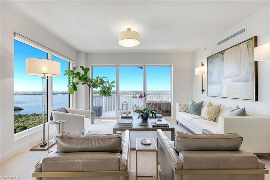 This LUXURIOUS and beautifully updated THREE BED/THREE BATH end-unit with Southwest exposure and unmatched sunset views, is truly one of the finest  high rise residences in Bonita Bay. Offering abundant natural light and upscale finishes throughout, this move-in-ready condominium features a private elevator entry lobby and a thoughtfully designed and sophisticated interior. The spacious living area allows access to an open air balcony overlooking the water, golf course and surrounding community, creating the perfect setting for evening sunsets. The living and dining areas flow seamlessly into the updated kitchen, while a glass-enclosed dining space with floor-to-ceiling windows provides the most impressive panoramic views. The primary suite, located off the living area, also captures the remarkable view and provides lanai access. The ensuite bath was thoughtfully redesigned to include a soaking tub, separate vanities, custom lighting and a large walk in shower with custom tile. Two additional guest bedrooms are privately tucked away on the eastern side of the home. One of the bedrooms  offers an ensuite bath and walk-in closet, and a third bedroom, currently used as a den, is conveniently located across the hall from the third full bathroom. Additional features include electric shades, two garage parking spaces, a private elevator lobby, unmatched amenities and so much more. Residents of Esperia at Bonita Bay enjoy a recently upgraded, exceptional amenity center featuring a state-of-the-art fitness facility, theater, social rooms, steam rooms, and a stunning resort-style pool--plus full access to the exceptional lifestyle and natural beauty of Bonita Bay. Bonita Bay offers an array of exceptional amenities, including a private beach club, kayaking, canoeing, pickleball, tennis, and multiple community parks. Explore over 12 miles of walking and biking paths, or take advantage of the full-service marina and restaurant. Golf enthusiasts will appreciate the FIVE on-site courses, complemented by several dining options, a state-of-the-art fitness center, tennis, and more--all available with club membership (additional fees apply). Ideally located close to ALL that Southwest Florida has to offer--world-class dining and shopping, pristine beaches, nature preserves, the burgeoning downtown Bonita Springs, and downtown Naples--plus RSW International Airport just a short drive away. Whether you're searching for a winter retreat or a permanent residence, this home could very well be THE ONE. Don't miss this exceptional opportunity.