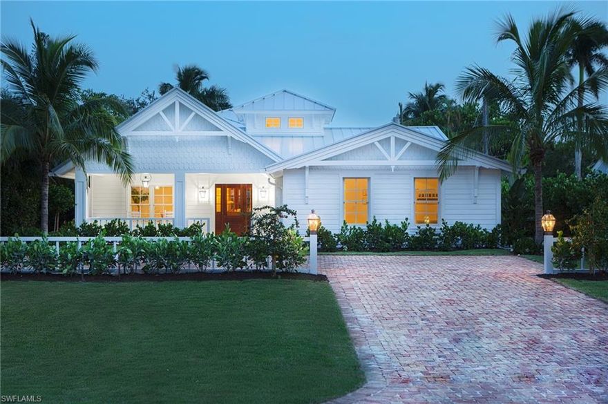 Just Completed!! This wonderful Smart Home has been completely renovated by award-winning designer, Kristen Williams. A transitional floor plan offers vaulted ceilings over a generous amount of indoor and outdoor living space for family time and entertaining.  The designer has revived this quintessential Old Naples cottage into a cleaner, simpler coastal look that also provides a sense of serenity.  A gourmet kitchen, featuring a Lacanche duel fuel range, has a large island covered in Mystery-white marble, and an abundance of storage. There is also a first floor study. The owner's suite is made complete with his and her walk-in closets, a bath with a custom vanity, duel sinks, a soaking tub, and large shower.  All other bedrooms en suite. Visitors will never want to leave the generously spaced second floor guest area which is a great flexible space. The fresh, and open, family room leads to a covered lanai made complete with an outdoor kitchen and a sitting area overlooking a spacious yard.  The pool and spa are each surrounded by shell stone and under southern exposure. See Floor Plan under Supplements.