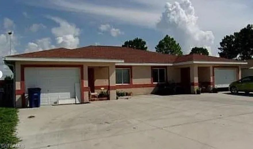 Welcome to this well-maintained 3 bedroom, 2 bathroom single-family home located at 689 Alabama Rd S, Lehigh Acres, FL 33974. This spacious residence offers an open floor plan with tile flooring throughout, a bright living area, and a kitchen with cabinet space.