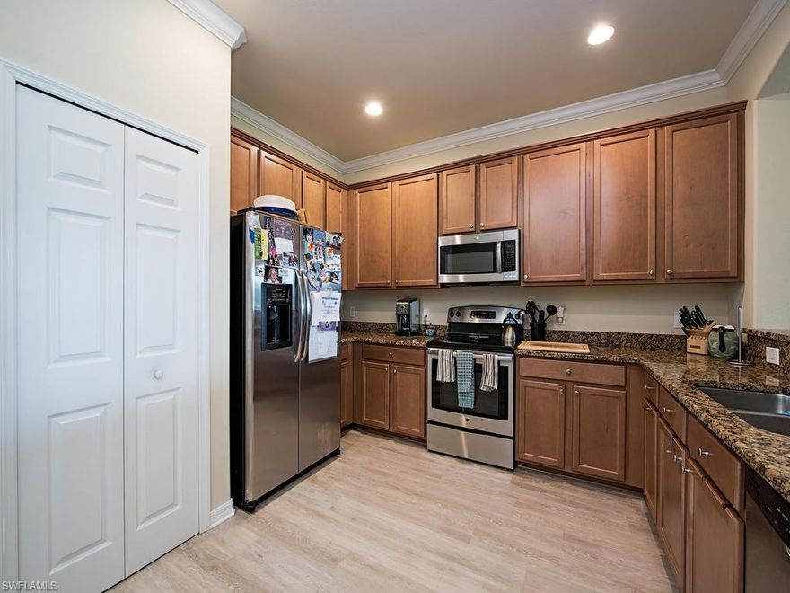 H.13305 - Popular spacious floor plan includes 3 bedrooms, 2 baths with a 2 car garage.  Freshly painted, upgraded granite in kitchen and both bathrooms, new tile in bathrooms, stainless steel appliances and new vinyl flooring in main living area.  Reflection Lakes community is conveniently located in South Naples less than 5 minutes to shopping and restaurants and 15-20 minutes to the beach! Club house area consists of a state-of-the-art fitness center, activity rooms, billiards, large screen TV, catering kitchen, outdoor heated pool with splash area & swim lanes, Low fees/NO CDD.  A pool can be added.