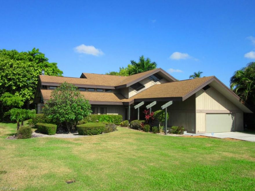 This contemporary 3 bedroom 2 bath pool home with vaulted ceilings, cross beams and wood burning fireplace offers a unique great room plan perfect for entertaining. Screened patio with sitting area leads to lush, secluded open pool area. The private second floor master suite opens to a wrap around balcony overlooking the pool area. Also on the second floor is loft/den area that boasts a perfect view of the family room architecture. Other upgrades include: renovated kitchen with stainless steel and custom backsplash, stained concrete floors and abundance of storage, and an oversized garage with built-ins! Conveniently located close to the newly revitalized downtown area and minutes to the beach.