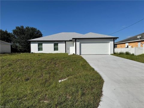 Photo of 3314 36th ST SW, LEHIGH ACRES, FL 33976 (MLS # 2025018711)