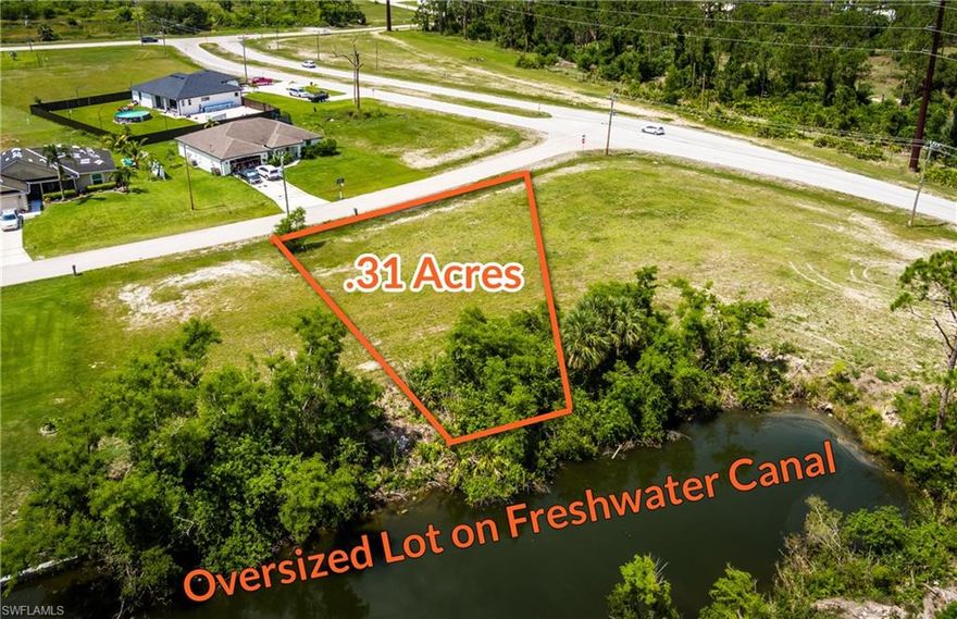 WONDERFUL FRESHWATER CANALFRONT SUPERSIZED LOT IN OUTSTANDING NEIGHBORHOOD!! GREAT OPPORTUNITY FOR YOUR NEW DREAM HOME!! Oversized lot on Freshwater Canal in a peaceful, beautiful and convenient part of Cape Coral!! This "stand out" lot is located in a nicely developed section of Cape Coral surrounded by beautiful homes. Fish and kayak from your own backyard! Call Today!