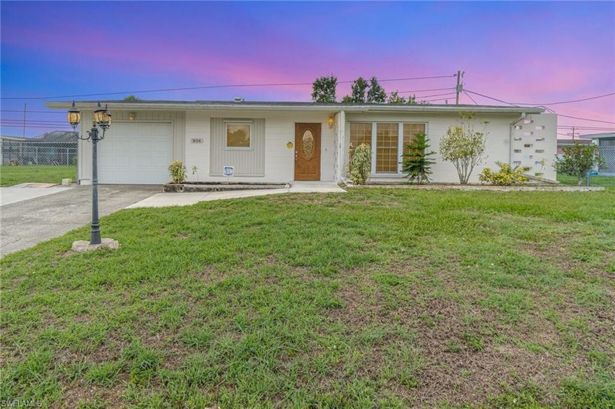 Brand New Roof (2025)! Move-in ready 3BR/2BA home with 1-car garage in an established Lehigh Acres neighborhood on city water and sewer. Ideal for FHA, VA, first-time buyers, or investors. Features include granite countertops, stainless steel appliances, remodeled bathroom, and a dedicated office/flex room perfect for working from home. ADA-friendly layout, in-home washer and dryer, and new water heater (2024). Enjoy added peace of mind with a Kohler 20 kW whole-house generator and 500-lb in-ground propane tank for backup power. Fenced backyard plus large storage/workshop area that can double as a reinforced safe room. Convenient location near schools, shopping, and restaurants. Schedule your private showing today!