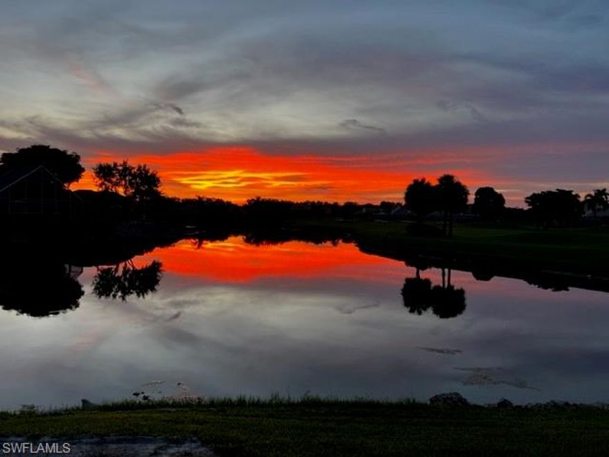 Discover unparalleled luxury at this prestigious residence, offering captivating sunset, lake, and golf course views. A generous $5,000 incentive for closing costs is also being offered from the seller.  A well-planned layout includes a first-floor Owner's Suite and two bedrooms on the second-level with Jack and Jill bathroom, each with walk-in closets and private balconies. A spacious loft serves as a den or office. The home boasts two large living spaces with one complemented by an elegant faux fireplace and accent wall for a warm ambiance.  Newly installed Hurricane impact windows and doors, a glass-tiled pool deck, a new pool heater, paver walkway, and driveway enhance the property's appeal. The outdoor grill and bar area with 6 chairs is included in the sale. Other recent upgrades include stainless steel appliances, outdoor lighting, washer/dryer, and wood flooring. Enjoy amenities including access to a restaurant, outdoor bar, pool, pro shop, tennis facilities, practice area, and putting green. Affordable golf dues are optional. The property is located in the 34119 zip code which is close to upscale shopping, dining, Gulf of Mexico beaches and Airports.