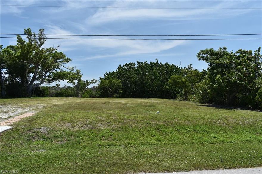 Lake front lot located in East Rocks. Extremely sought after, East Rocks is a quiet residential neighborhood with multiple cul-de-sacs across the street from beach access #1 and #2. This lot has wonderful river/lagoon water views, mature trees and a mecca for wildlife. Eastern exposure overlooks Preserve to top off this ideal ready to build opportunity for the dream paradise address. White sand beaches off West Gulf Drive known for its world renowned shelling, shoreline fishing and year round sunsets. Tucked away, yet easy access via the Gulf Drives to Causeway and Rabbit Road to bike paths, fully equipped Recreation Center, and the highly accedited K through 8 Sanibel School and Gold Coast of Captiva Island.