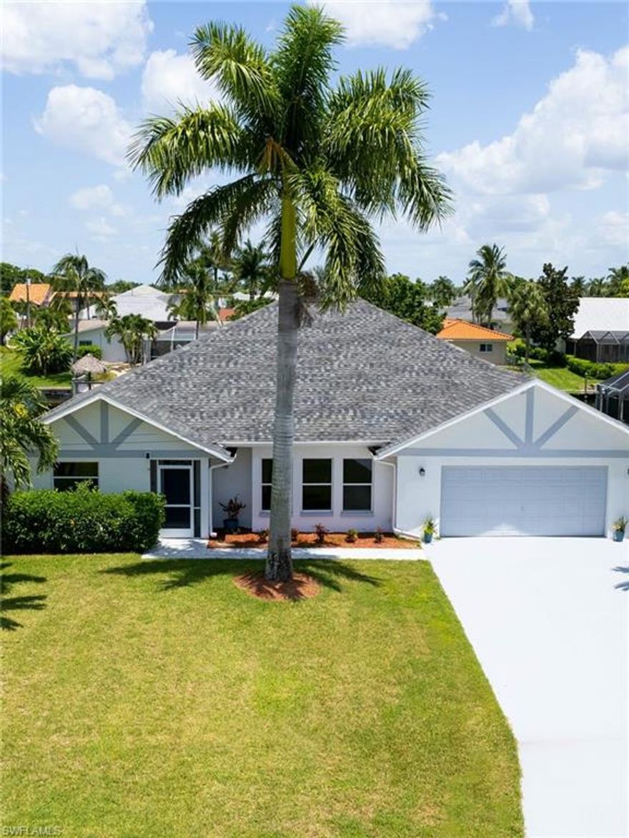 This spectacular 5-bedroom, 3-bathroom waterfront retreat in South West Cape Coral offers the ultimate Florida lifestyle, making it an exceptional choice for a high-performing vacation rental or a spacious family sanctuary. Situated in a premier yachting neighborhood, this home provides deep direct Gulf access with no bridges, allowing for effortless boating to the Caloosahatchee River and local beaches from your private composite dock and 10,000 lb walk-around boat lift. The property underwent extensive renovations in 2021 and 2022, including a brand-new roof, a massive kitchen remodel, and modern updates to two of the three bathrooms. Inside, soaring cathedral ceilings and cool tile flooring create an airy, expansive atmosphere, featuring a versatile floor plan where bedrooms can function as private suites, complete with a dedicated workout room.
The outdoor living space is a true resort-style oasis designed for entertaining year-round. The massive screened lanai houses a sparkling pool that was resurfaced in 2022, complemented by a freshly resurfaced pool deck and an additional enclosed Florida Sun Room that offers stunning canal views. With all assessments fully paid and critical systems like the AC and water heater updated in 2016, this home is as practical as it is luxurious. Ideally located near the Pelican area, Cape Harbour, and the Westin, the property is just minutes from the area’s best dining and shopping. To make this an immediate turnkey investment, the high-quality furnishings are included, allowing you to begin enjoying or renting this "killer vacation rental" from day one in 2026.