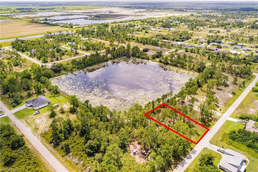 Affordable LakeFront Lot with (80-feet) of unobstructed lake views! This is one of the largest fresh water lakes in Lehigh Acres. This is the perfect location for your new estate home or rustic cabin. It's a beautiful 1/4 acre lot (80 ' x 136') with an additional (22') buffer-zone extending from the rear property line to the waters edge. Lot is already cleared, high and dry, ready to build, saving you thousands. Imagine the beautiful view you will have of the lake from your back patio or gazebo. Here you will be able to kayak, canoe, fish, bird watch or just relax and meditate in your own private oasis. . (This is the perfect place for your new lakefront lifestyle). Taxes here are low and there are no (HOA) or time limit to build. Lots of new construction in the area. Conveniently located close to Fort Myers but without the traffic and noise of the city and at a lot better price point. IF YOU WANT A REAL LAKEFRONT / WATERFRONT LOT THEN THIS IS IT... Quick response on all offers and or propositions...