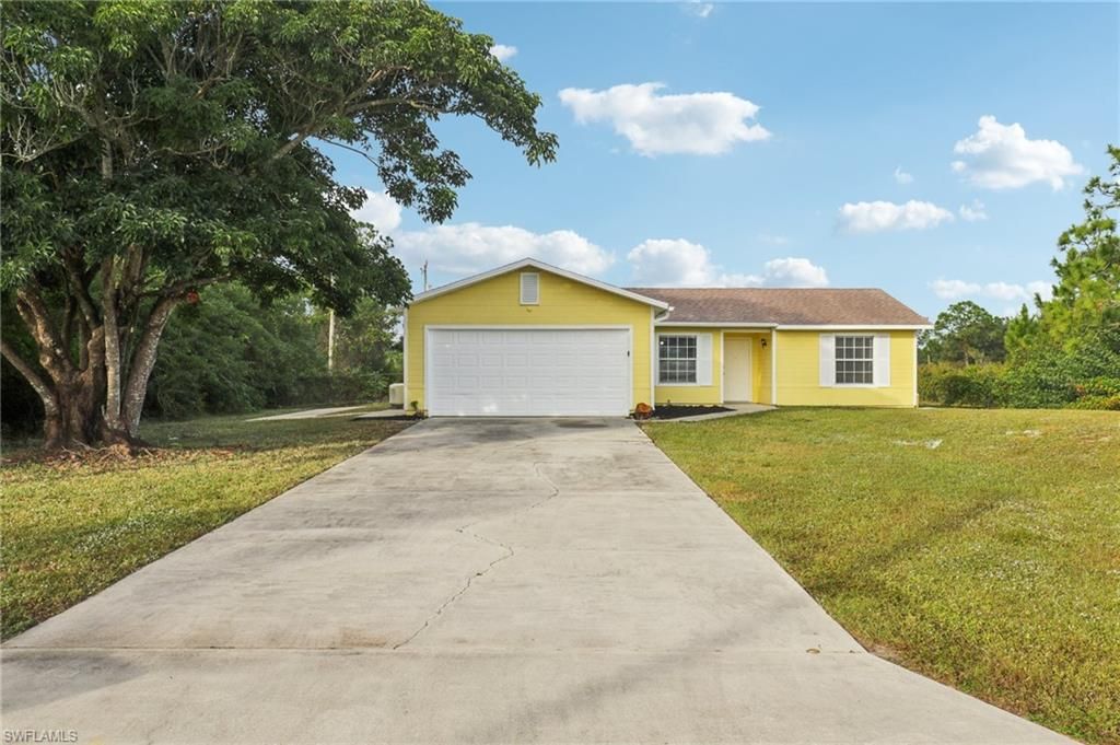 Photo of 519 Leroy AVE, LEHIGH ACRES, FL 33972 (MLS # 225083455)