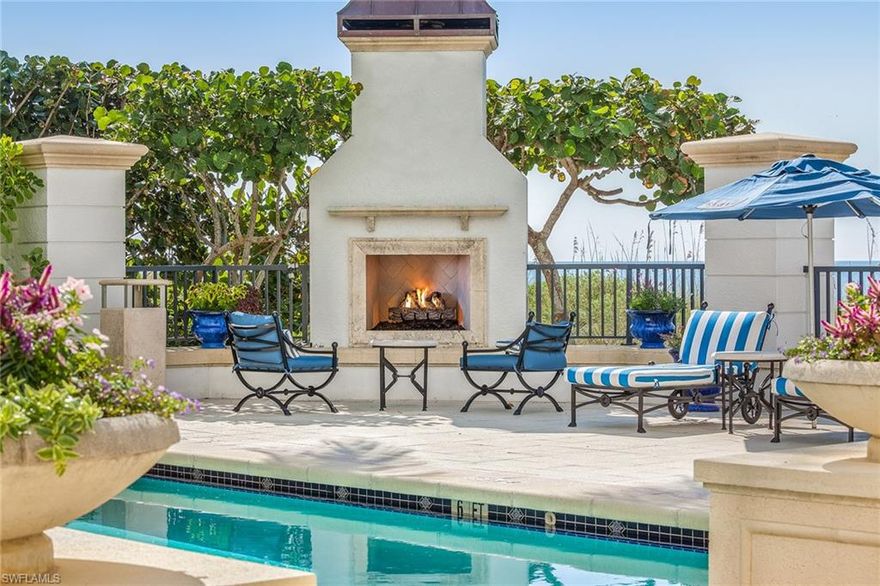 Top floor penthouse over the surf. Best of the best. Toes in the sand, intimate Sancerre. Located beachfront amid the ambiance of Old Naples in a quiet residential section of Gulf Shore Boulevard. Penthouse 01 provides the ultimate in luxury concierge living with open concept great room living overlooking a stunning southwest view of Naples pristine white sand beaches along the Gulf of Mexico blue water. Two car enclosed temperature controlled and oversized garage with large storage closet. Private access elevator opens to your personal foyer and you’re immediately greeted by the water views through high volume ceilings with generous glass. Crisp marble flooring and backgrounds lean in the contemporary direction. Gas cooktop and fireplace. In residence guest cottage with kitchenette is perfect for close friends and family, and for more privacy, Sancerre offers two guest suites with connecting gathering room. Poolside fireplace is illuminated each evening for that perfect spot to watch the sunset. Or the concierge will put out beach chairs and umbrellas for you. Pet-friendly, intimate building.