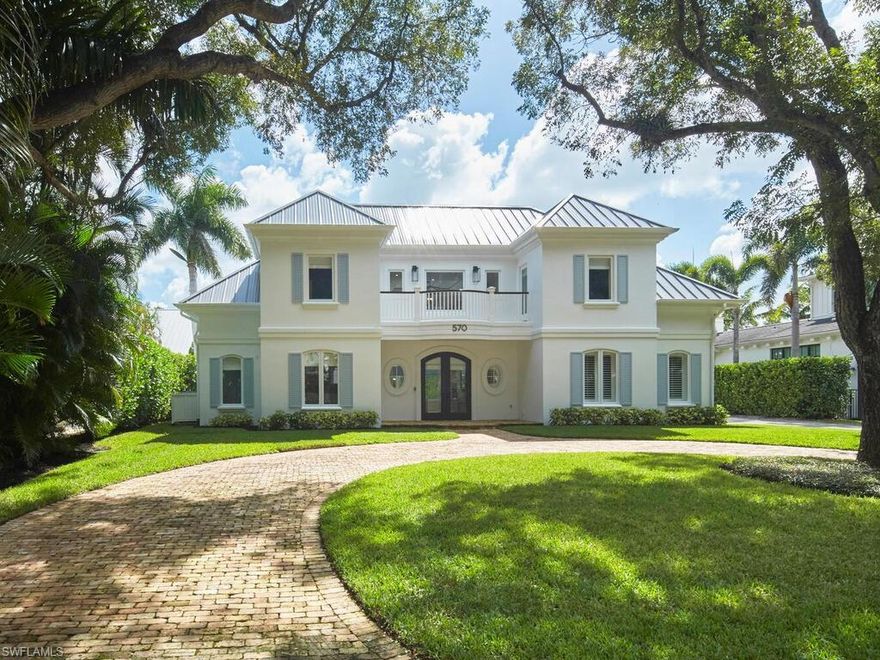 Coastal Home in the Heart of Old Naples. Four blocks from the beach, this 4-bedroom plus den, 3½-bath residence is perfectly positioned on one of the most coveted avenues in Old Naples with southern rear exposure in the desirable X500 flood zone. The home spans 3,772 square feet under air (4,262 total), featuring concrete block construction on both floors and impact-resistant windows and doors for lasting peace of mind. This home captures the essence of the Naples coastal lifestyle – light, bright, and beautifully finished. Completely renovated, the interior showcases custom finishes, designer wallpaper, wide plank wood flooring, plantation shutters and custom window treatments, blending timeless elegance with modern design. The chef’s kitchen features Quartzite countertops, high end Wolf and Sub-Zero appliances, dual wall ovens, beverage and freezer drawers, and a large island ideal for entertaining. The first-floor primary suite includes a spa-inspired bath, freestanding tub, and walk-in shower. Upstairs, two of the three guest bedrooms and a second family room open to private balconies, while both levels feature Maytag laundry appliances.Outdoors, enjoy the saltwater pool equipped with a Pentair automation system, heater and chiller, a brand new 2025 standing-seam aluminum roof and custom shutters, ensuring style and durability for years to come. This home is just minutes from Fifth Avenue South, Third Street South, Naples Pier, and Wynn’s Market.