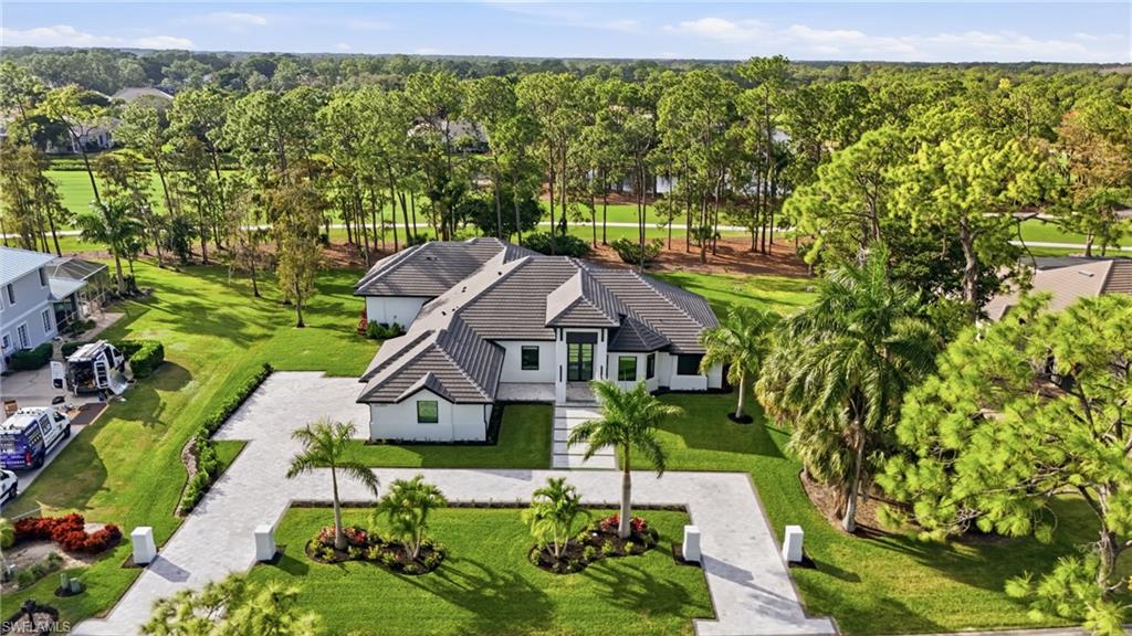 Photo of 13455 Pond Apple DR E, NAPLES, FL 34119 (MLS # 225084260)