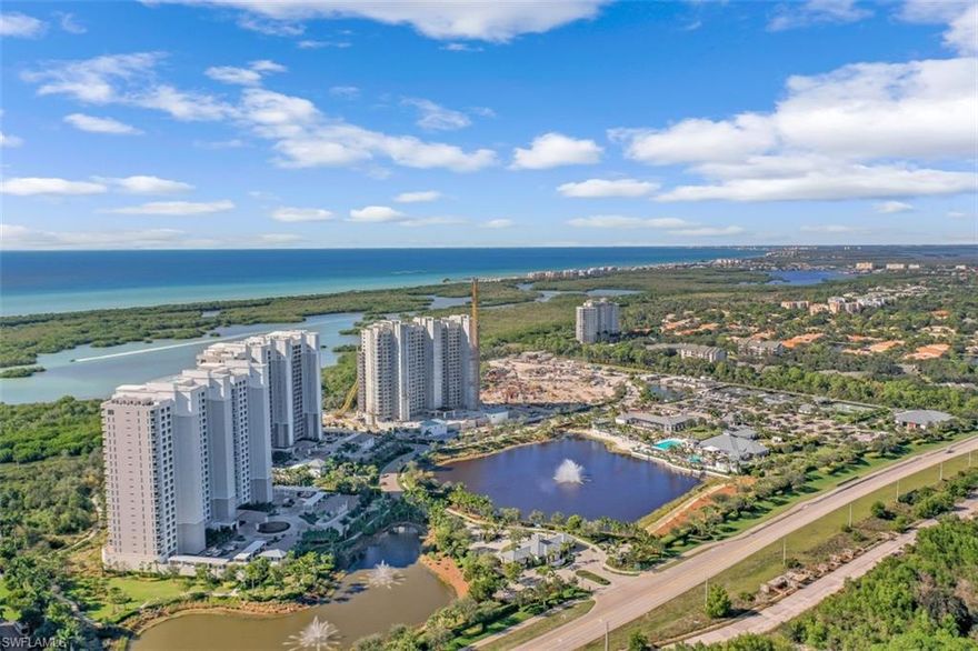 Introducing the epitome of luxury and sophistication in the coveted Kalea Bay community! This stunning 2 bedroom, 3.5 bathroom residence is situated on the third floor, offering views of lush natural surroundings and wild life. The open floor plan is perfect for entertaining guests, boasting a gourmet kitchen with high-end appliances, a spacious living area, and a dining room with access to the expansive lanai. The master suite is a true oasis, featuring a private balcony entrance, a very large walk-in closet, and a spa-like ensuite bath with a soaking tub and dual vanities. The guest wing is comprised of one additional bedroom, a separate den, and a fully equipped office. Additional highlights of this immaculate home include hardwood flooring throughout, a laundry room, and hurricane impact windows and doors for added peace of mind. Residents of Kalea Bay enjoy world-class amenities, including a resort-style pool, fitness center, tennis courts, and a clubhouse.