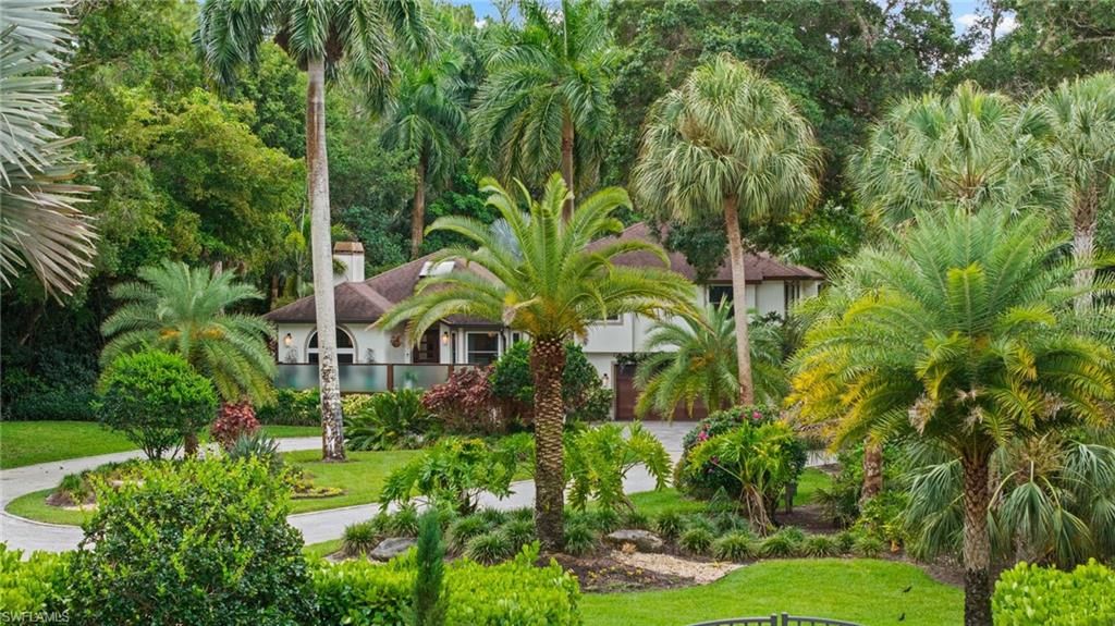 Photo of 5070 Tamarind Ridge DR, NAPLES, FL 34119 (MLS # 226020550)