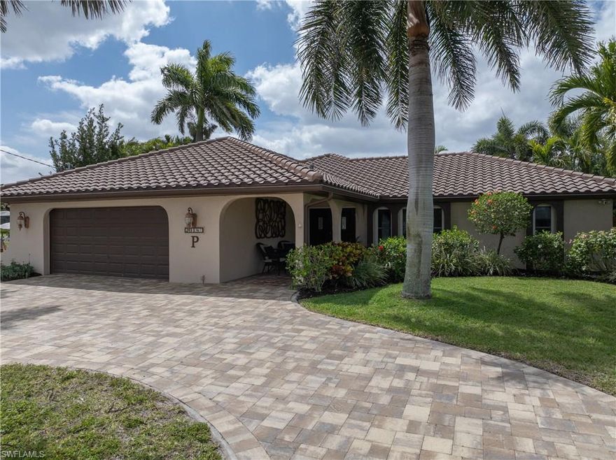 Beautifully remodeled and upgraded Direct Gulf Access Pool Home in the Cornwallis neighborhood. This home has been immaculately maintained and is move-in ready with furnishings included. This is the waterfront Florida lifestyle you are looking for! The front exterior features a pavered circular driveway surrounded by lush landscaping with stately Royal Palms. Step into the double front doors to a spacious open floorplan with high ceilings. The large kitchen has upgraded cabinetry, granite counter tops, a huge island and plenty of cabinet space with an added built-in wine cooler. Sliding glass doors open up to the sparkling pool and screened lanai with a highly desired Southern exposure. Primary bedroom also has a slider leading to the pool area. Primary bath features dual vanities, a large glass shower and walk-in closet with built-in shelving. Two furnished guest bedrooms, and one has a sliding door leading to a wood deck in the back yard with plenty of foliage for privacy. Impact Windows give peace of mind for storm protection. The dock features a Captain’s Walk and 10,000 lb boat lift, and just a few minute boat ride to open water! New Roof 2021, New A/C 2024, New Pool Cage 2020, New Pool Pump and Heater. Schedule your personal tour today...you won't be disappointed!