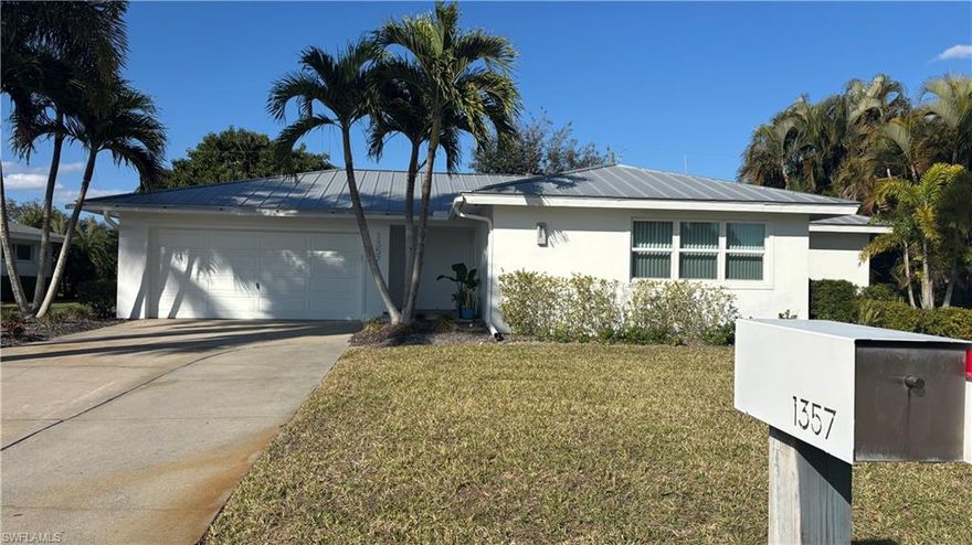 Meticulously updated and move-in ready, this exceptional 2-bedroom, 2-bath Michigan Homes-built ranch is located in the highly desirable McGregor neighborhood of Tanglewood. Blending timeless design with modern upgrades, this unique home offers peace of mind, upscale finishes, and the ideal Southwest Florida lifestyle.

Recent improvements include hurricane impact windows, front door, and sliding glass door (2025), new water heater (2025), new A/C system (2023), and a galvanized steel standing seam roof (2018). Located in an X500 flood zone, flood insurance is not required, and the home experienced no issues during recent storms—providing confidence and convenience for a true “lock-and-leave” property.

The thoughtfully designed kitchen is the centerpiece of the home, featuring GE Monogram appliances with an induction cooktop and vented hood, solid wood cabinetry, and an expansive Corian island with seating for six—perfect for entertaining or everyday living. The open living area is wired for surround sound with built-in speakers and clean, no-wire TV mounting for a sleek, modern aesthetic.

Both bathrooms have been beautifully updated with tiled showers and frameless glass doors. Abundant natural light fills the home, enhanced by a large glass slider overlooking the spacious backyard. The fully fenced yard is maturely landscaped for ultimate privacy and includes a custom-built gazebo/pergola with a metal roof—ideal for hosting gatherings or relaxing outdoors. There is ample space for a future pool, ADU, or home expansion.

The garage features a full wall of built-in cabinetry, offering excellent workshop space and organized storage.

Ideally situated just minutes from Downtown amenities, riverside walks, and biking along scenic McGregor Boulevard, this home provides convenient access to everything Southwest Florida has to offer. Stylish, secure, and superbly located—this is the perfect modern bungalow to call home.