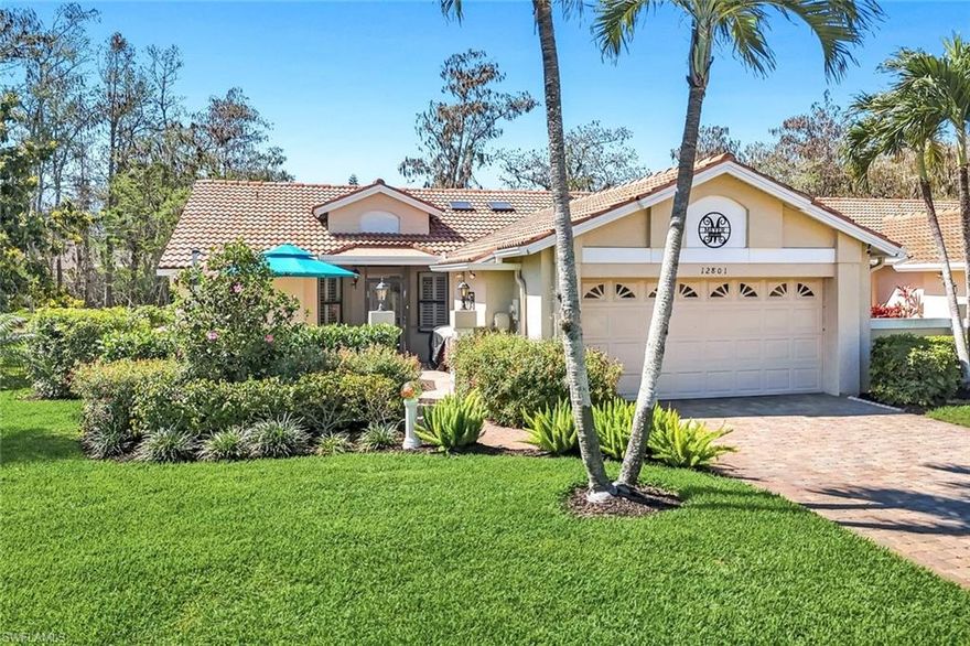 Golf Membership Included ($50,000 value)! Move-in ready 3 bedroom, 2 bath attached villa home with a functional split-bedroom layout designed for comfort and privacy. Beautifully updated throughout including fixtures and refreshed palettes. This end residence features an open great room floor plan that flows seamlessly to the spacious lanai for comfortable indoor-outdoor living with a paver patio just beyond, offering a private outdoor retreat. The kitchen offers quartz countertops, modern finishes, and excellent functionality, while both bathrooms are tastefully finished with quartz countertops for a fresh, move-in ready feel. The primary en-suite bedroom provides comfort and privacy, and the private guest suite includes two bedrooms with a shared bath, making it ideal for guests or family. A paver courtyard entry adds charm and additional outdoor living space, while the large paver driveway and two-car garage provide ample parking, storage, and convenience!  Hunters Ridge is a private Golf & Country Club, not a bundled community. With only 420 golf members and no Chelsea system, golf enthusiasts enjoy the freedom to play as often as they like. The Club is known for its welcoming, relaxed atmosphere and offers a vibrant calendar of social and golf activities. Only six miles from Barefoot Beach Preserve, Hunters Ridge provides quick access to premier shopping, dining, entertainment, and RSW Airport. Within the community, residents enjoy an 18-hole championship golf course, state-of-the-art golf simulators, a spacious resort style pool with food and beverage service, tennis courts, pickleball courts, and much more. The clubhouse features both elegant dining and a casual grill room. Adding to the lifestyle appeal, a major renovation is currently underway. The Activity and Fitness Center is being transformed into a modern, updated Community Center with expanded fitness and wellness amenities an exciting enhancement that will elevate daily living, increase home values, and truly bring resort style wellness to your doorstep.