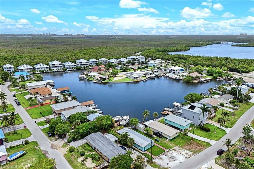 Fully Renovated Duplex in Goodland – Gateway to the 10,000 Islands Don’t miss this rare opportunity to own a beautifully remodeled duplex in the heart of Goodland, one of Southwest Florida’s last authentic fishing villages and a hidden gem on the edge of the renowned 10,000 Islands. This charming coastal property offers two mirror-image units, each boasting 2 spacious bedrooms, 1 full bathroom, and a bright, open-concept layout – perfect for full-time living, seasonal getaways, or as an income-producing rental. Each unit has been completely remodeled with a modern coastal flair, including durable tile flooring throughout, sleek finishes, and thoughtful design updates. The full kitchens in both units are equipped with electric and propane hookups, providing flexibility and efficiency for cooking. Freshly installed split wall A/C systems offer energy-efficient climate control, ensuring comfort year-round. Enjoy private laundry in each unit with individual washers and dryers, adding convenience and functionality for residents or guests. One of the units features a screened lanai, perfect for morning coffee or sunset cocktails, while taking in the tranquil surroundings and subtropical breezes. The property is topped with a metal roof, providing durability and peace of mind for years to come. Outdoors, you'll find plenty of space to relax or store recreational gear, with close proximity to the county boat ramp – just minutes away. This unbeatable location places you at the doorstep of world-class fishing, boating, kayaking, and island-hopping adventures in the pristine backwaters and mangroves of the 10,000 Islands and Everglades National Park. Goodland is a tight-knit, vibrant community known for its laid-back island lifestyle, local seafood restaurants, music-filled weekends, and welcoming neighbors. Whether you're looking to enjoy it all yourself or generate rental income, this duplex offers endless flexibility and investment potential. No HOA, no rental restrictions. With the growing demand for vacation rentals and seasonal homes in Goodland and Marco Island, this duplex is a smart investment and a rare chance to own a slice of paradise where Old Florida charm meets coastal adventure. Live in one, rent the other — or rent both! Either way, you’ll enjoy steady income potential in a location that continues to draw nature lovers, anglers, and island seekers from around the world.
