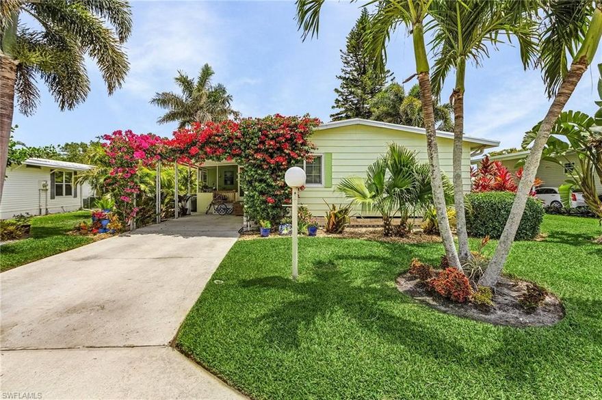Enjoy outdoor entertaining? This home is tucked away on a beautiful tropical Florida landscaped lot! Enjoy the sun on th 14x13 inviting deck or sit under a lovely shaded tree. So much privacy! Like to admire nature from inside? Relax in a beautiful Florida room with vaulted ceiling and central air. New subflooring and luxury vinyl wood flooring in 2022. New roof in 2019,A/C in 2021,washer and dryer in 2020. New electrical panel in 2018. Storm ready tie downs in 2020 and new deck in 2024. This home is being offered partially furnished and ready for a new owner! Riviera Golf Estates is a desirable over 55 community. Enjoy the saltwater pool with lap lanes,Tiki hut and clubhouse for social activities. Also shuffleboard,pickleball,tennis,Bocce and our own fitness room, library and billiard room. The HOA is $431 per quarter and YES you own the land! All this just 15 minutes from 5TH Ave. and beautiful beaches! Sellers flood insurance is transferable.