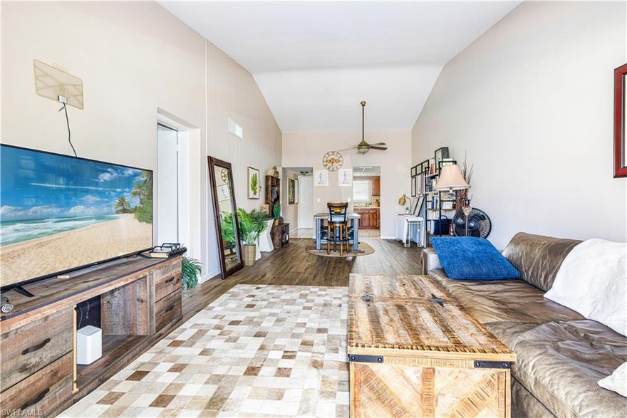 Step into a home that feels peaceful from the moment you arrive. This corner 2-bedroom, 2-bathroom condo in a quiet community offers a sense of ease and comfort that’s hard to find. The vaulted ceilings and open living-and-dining layout create a bright, airy space perfect for relaxing or hosting friends.  A surprisingly spacious walk-in pantry adds convenience, while the new whole-home surge protector provides peace of mind.
The large screened patio becomes your personal retreat—overlooking the courtyard and the community pool, with a partial preserve view that brings nature right to your doorstep.
Nestled in a quiet, serene location yet close to shopping, dining, and everyday conveniences, this condo offers the perfect blend of comfort, convenience, and low-maintenance living.  Ideal for seasonal or year-round residents looking to enjoy the best of Florida’s 55+ lifestyle.