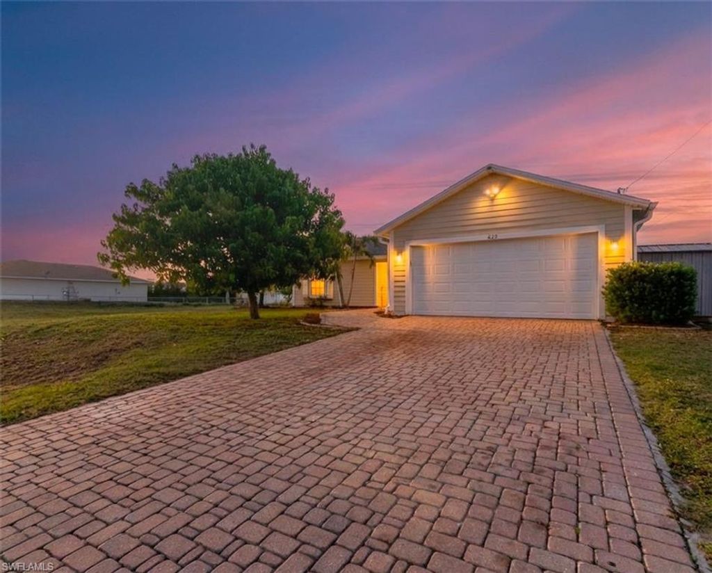 Photo of 625 SW 31st ST, CAPE CORAL, FL 33914 (MLS # 226003825)