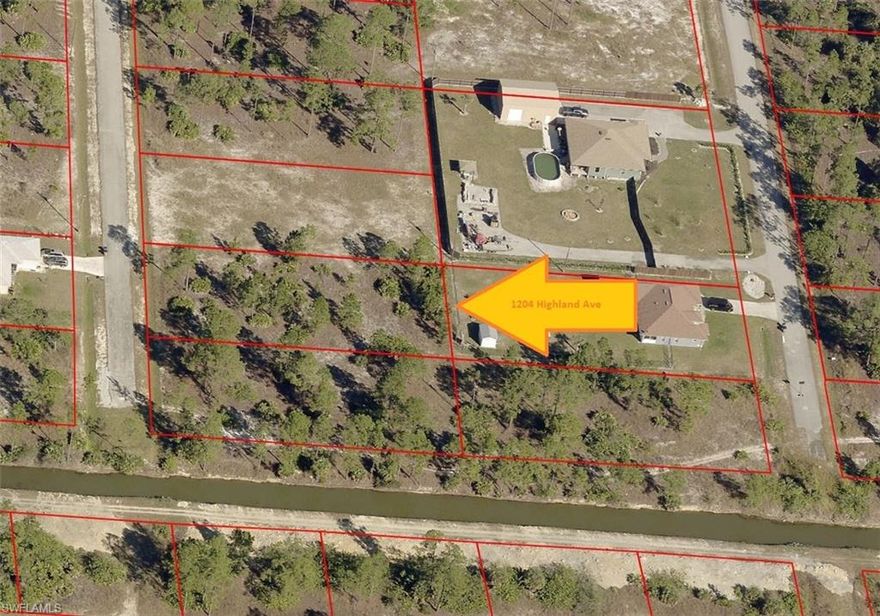 Build your dream home on this spectacular Half of an Acre lot (105' X 208') on a low traffic, Paved street in a fast growing area of Lehigh Acres. Located a few minutes from Fort Myers, The Fort Myers International Airport and major interstates. There are many choices for shopping, recreational, and schooling for all ages. Call today as prices are rising and new home construction is booming.