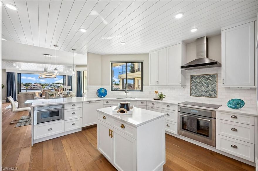 Step into the ultimate blend of exclusivity and luxury with this elegant waterfront residence on Venetian Bay offering breathtaking water views and Gulf sunsets. Offered furnished and completely renovated by Sand Dollar award winner, Midwest Developers LLC, with meticulous attention to detail, this stunning home captures sweeping water views from every room, perfect for enjoying both sunrises and sunsets. Enjoy the convenience of an under-building private garage with two parking spaces, extra storage and a private elevator entrance. Indulge in waterfront luxury with private access to Naples' premier beach with a private access point directly across the street. A short stroll takes you to Venetian Village right next door with over 60 shopping & dining options. For boating enthusiasts, a newly renovated boat slip, dock and boat lift is available for purchase. Ardissone is in the process of a 2 phase comprehensive exterior redesign and upgrade with phase 1 approved and assessments paid by the seller. Phase 2 is proposed to complete the pool redesign and pavers. The reimagined building will add to the coastal appeal. Live the Naples lifestyle in this exceptional waterfront property.