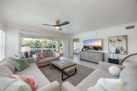 Photo of 6151 Pelican Bay BLVD #27, NAPLES, FL 34108 (MLS # 226027877)