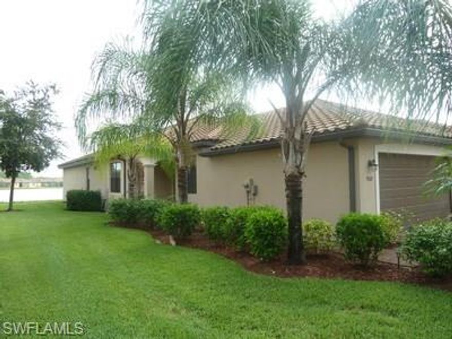 LOOK NO FURTHER, you have found your home in Paradise.LOWEST PRICE VILLA IN REFLECTION ISLES!  This 2/2 plus den; is a Beautiful attached lakefront villa in a tropical setting with clubhouse,workout center,community pool,and all  within 1/2 block of residence. Owners have upgraded this to the hilt with granite counters,crown molding,tile on the diagonal, bedrooms and den have beautiful wood floors and there is.lots of additional indirect lighting.In addition there are designer fans and the  pavered patio has been bumped out for you to enjoy the beautiful lake setting.The master suite has two closets,a master bath with dual sinks, plus a shower and soaking tub.Low HOA fees pf $215 monthly and no CDD fees make this a great buy.Call to set your appointment now.