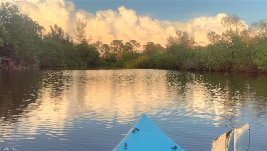 This beautiful "Old Florida" property offers a serene escape, reminiscent of a Clyde Butcher photograph, with an abundance of natural beauty and wildlife right outside your door. Imagine being able to paddleboard or kayak directly from your front door, enjoying the incredible birds and nature that define this part of Florida. What makes this opportunity even more exceptional is its location within the Bayshore District, one of Naples' most sought-after markets. This vibrant area offers an unparalleled lifestyle with walkability to a variety of attractions, including popular restaurants, bars, the exquisite Naples Botanical Garden, and events at Sugden Park. You'll also have easy access to activities like pickleball, boating, and biking. Furthermore, a newly approved boardwalk will connect Bayshore Drive to Sugden Regional Park, significantly enhancing accessibility for joggers and bicyclists. Owning a property like this in Naples is truly a rare find, especially with the Bayshore area's growing emphasis on boating and walkability. Downtown Naples, 5th Avenue shopping, and Naples' beautiful beaches are all just a short drive away, completing the picture of an ideal Southwest Florida lifestyle.