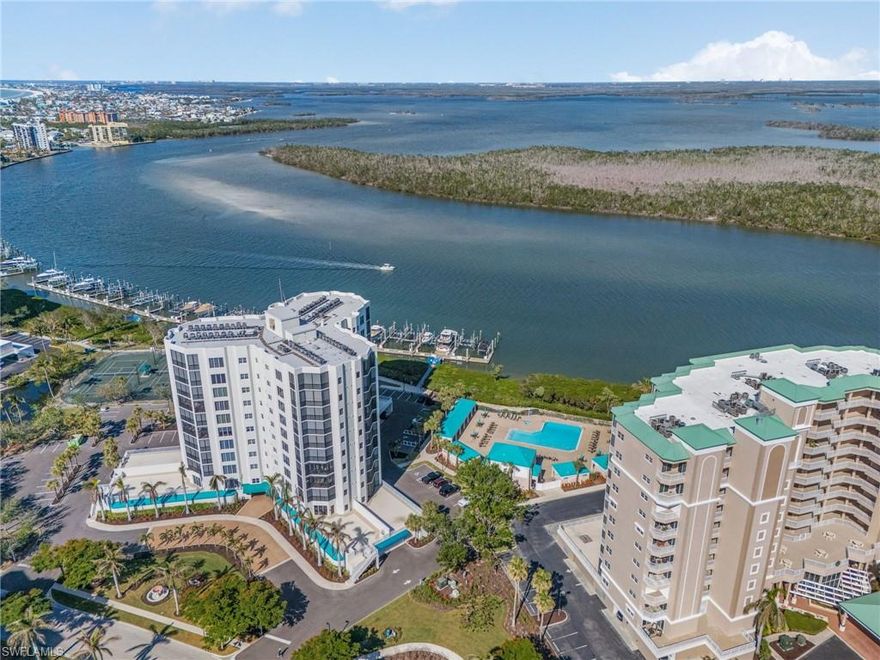 PANORAMIC VIEWS OF THE GULF & ESTERO BAY CAN BE SEEN THROUGHOUT THE CONDO!  2 Bed / 2 Bath condo with open floor plan and floor to ceiling windows in the living area.  Condo includes DEEDED UNDER BUILDING ENCLOSED PARKING GARAGE SPOT along with multiple storage units and electric hurricane shutters on the lanai.  Resort style amenities include a pool & hot tub, fitness center, tennis/pickleball courts, fishing pier, private guest suites, and social room.  Waterside is located on the south end of Ft. Myers Beach with deeded beach access.  Boat slips are available for lease or purchase.  CALL TODAY!