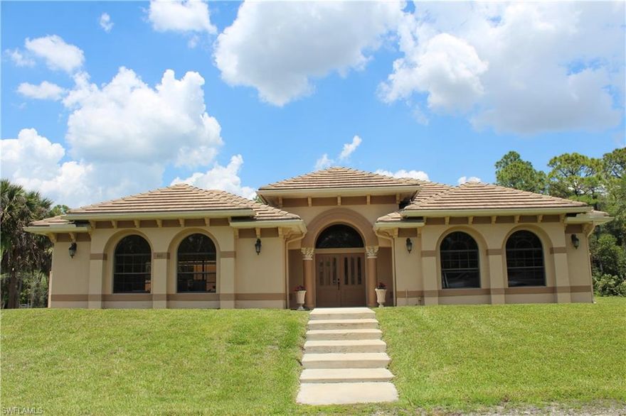 Experience the perfect blend of luxury, privacy, and functionality in this meticulously maintained custom-built courtyard estate, nestled on 2.27 acres with CITY WATER already connected in a highly sought-after location. Proudly offered by the original owner, this exceptional pool home is in pristine, move-in-ready condition and showcases quality craftsmanship throughout. Designed for elegant indoor-outdoor living, the property features a sparkling private pool and not one, but two expansive screened lanais—ideal for entertaining or simply relaxing while enjoying the peaceful surroundings. Inside, the home offers tile flooring throughout and a spacious, thoughtfully designed layout that reflects both comfort and style with many upgrades, A new roof installed in 2020 adds lasting value and peace of mind. Adding to the home’s incredible versatility is an oversized room, perfect for a home business, mother in law suite, hobbies, Studio, or endless customization possibilities. Ideally located in an A-rated school district and just minutes from NEW SHOPPING CENTER, dining, and modern conveniences, this one-of-a-kind property offers the rare combination of acreage, luxury, and convenience—an extraordinary opportunity to own your private piece of paradise.