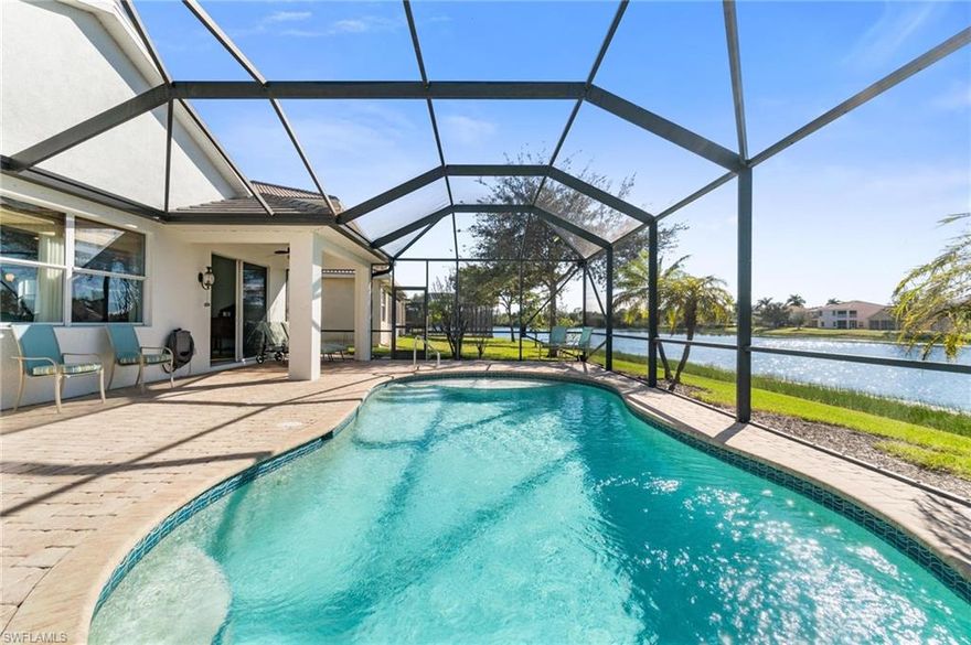 PRICED TO SELL!  This stunning home features 3 Bedrooms, 2 Bathrooms, and a Heated Pool overlooks the lake and the most breathtaking sunsets. With a large, open floor plan and vaulted ceilings, this light, bright and airy, modern home will be your private oasis in paradise in the Valencia Golf & Country Club of Naples.  New Roof in 2021. Ideal for Full Time Residence or a Vacation Home, it is located only minutes from the new Founders Square shopping & dining center and the brand new 150 acre Big Corkscrew Island Regional Sports Park / Aquatic center. Valencia Golf & Country Club is a gated community with tons of amenities including a breathtaking resort-style pool and spa, and an incredible Clubhouse complete with exercise facilities, billiards room, card room, library, kitchen, and movie theater room. The newly renovated 18 Hole Public Golf course with Driving Range, Pro Shop & Patio Bar offers variety of optional memberships, as well as pay-as-you-play (Golf Memberships are not mandatory). Best value in North Naples - this home won’t last long!