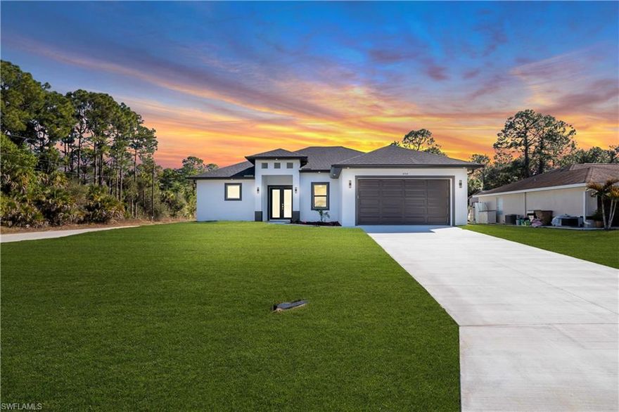 Discover this beautiful residence in Lehigh Acres, Florida, offering a blend of modern comfort and sophisticated design. This home immediately impresses with the peace of mind provided by hurricane-impact windows and doors throughout. Inside, you'll find three generously sized bedrooms, complemented by a versatile dedicated office space that easily adapts into a fourth bedroom. With 2.5 bathrooms, including a convenient half bath that opens directly to an extended terrace, the property is perfectly set up for seamless indoor-outdoor living and backyard entertaining. The heart of this home is its open-concept kitchen, boasting elegant wood and acrylic cabinetry, quartz countertops, and a distinctive contemporary layout. Practical features include a two-car garage with a convenient side access door. This exceptional property is nestled within Lehigh Acres' vibrant, growing community. Don't miss the chance to experience it firsthand; schedule your private tour today!