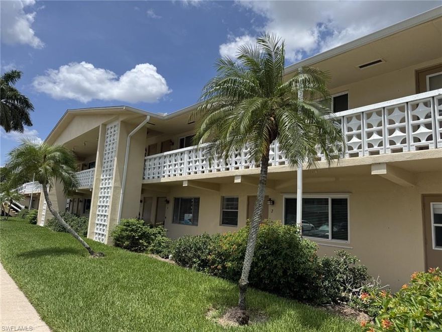 This is a wonderful 2 bedroom plus sunroom/den, 2 bath with laundry inside the home.  You will love the huge living room, large dining room, kitchen with separate entrance and lots of cabinets/counter space. The current owner says the power bill has never been over $75. Both bedrooms have large closets and each has a second closet in the sunroom area.  There are hurricane impact windows, tile floors throughout, crown moldings and so much more.  The air conditioning and heating are brand new and the roof on the building is about 2 years old. This building has never flooded. It doesn't get any better than this at this price!