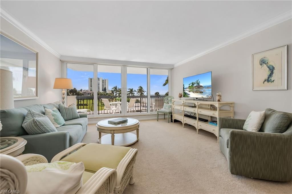 Photo of 4001 Gulf Shore BLVD N #207, NAPLES, FL 34103 (MLS # 226006374)