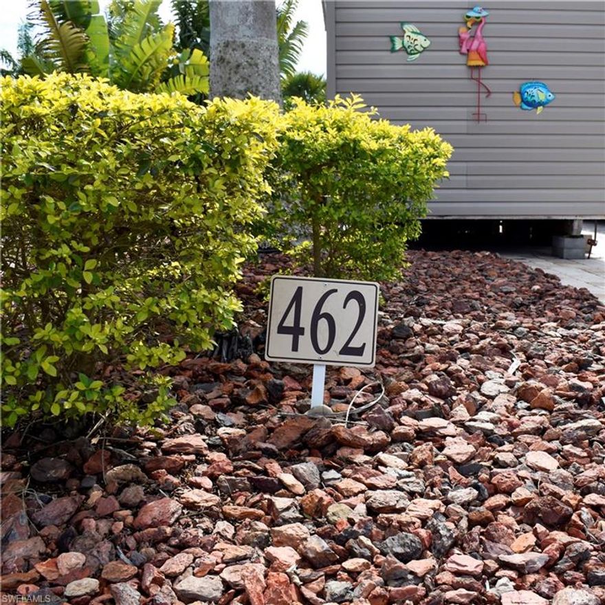 This 35 x 90 pavestone lot features an unfinished shed equipped with electrical and plumbing, offering the perfect opportunity to design and customize your own space. The lot also comes with a tiki hut, fans, lights, or shades, along with lush, mature vegetation, creating your own private slice of paradise. Plus, it offers easy access in and out of the resort for added convenience