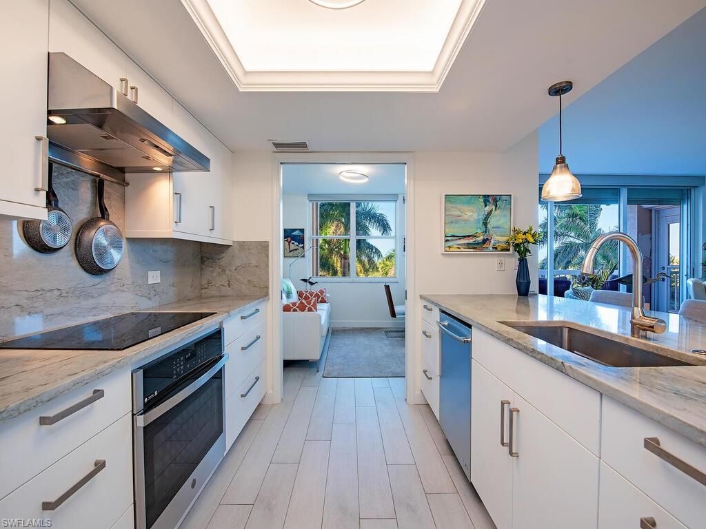 Photo of 6585 Nicholas BLVD #303, NAPLES, FL 34108 (MLS # 225076482)