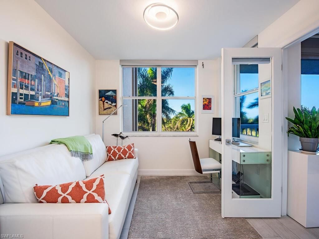 Photo of 6585 Nicholas BLVD #303, NAPLES, FL 34108 (MLS # 225076482)