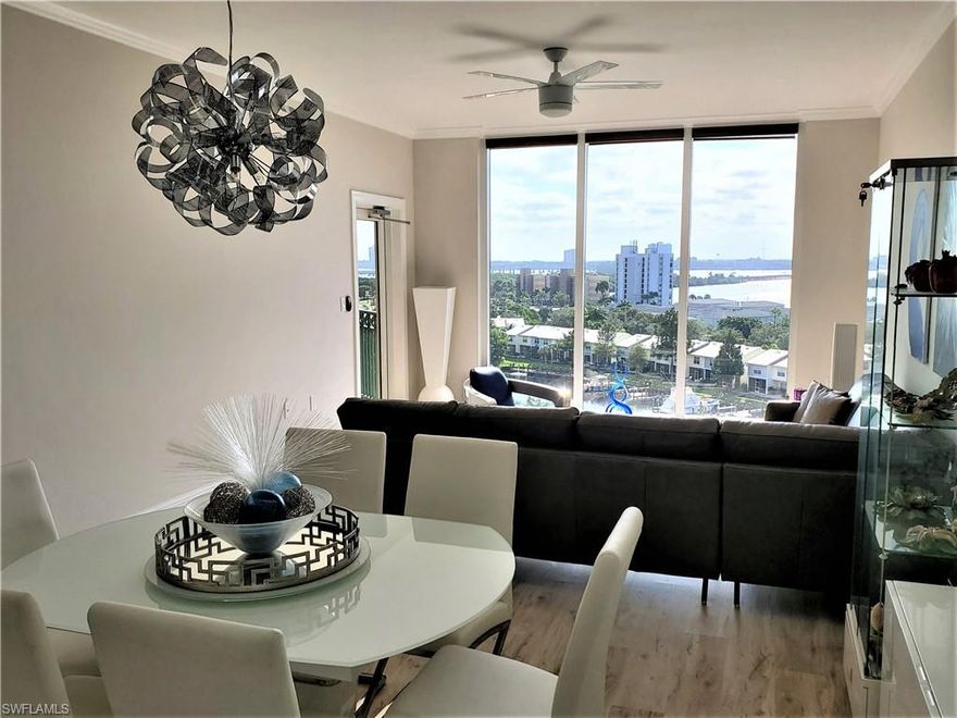 Enjoy INCREDIBLE VIEWS of the canal, marina, Caloosahatchee river, downtown Fort Myers, and the pool – all from your spacious 9th floor TURNKEY condo in the GATED and PET FRIENDLY North Star Yacht Club community. This meticulously maintained, open concept unit boasts floor to ceiling impact windows, new vinyl plank flooring (NO CARPET ANYWHERE), 42” raised panel wood cabinets, granite countertops, stainless steel appliances, and stylish, like-new, contemporary furnishings. Your extra-large balcony will offer all the benefits of outdoor living. The master bedroom suite includes a large master bath and two walk-in custom closets. Master and guest bedrooms both have floor to ceiling windows and balcony access. Garage and outdoor parking as well as garage storage are included. North Star Yacht Club is resort-style living with 12 acres of lush landscaping, tennis courts and Olympic size heated pool and spa. The 15,000 sf clubhouse provides theatre, aerobics and fitness centers, and much more! Four waterfront restaurants are within walking distance and the Downtown River District is just 5 minutes away, with a free trolley that runs Nov–May. Just bring your clothes and move right in!