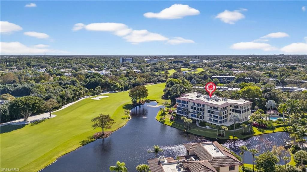 Photo of 6020 PELICAN BAY BLVD #E302, NAPLES, FL 34108 (MLS # 226003424)