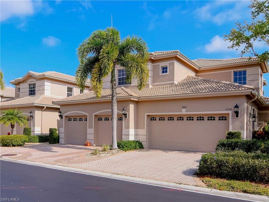 DRAMATIC PRICE IMPROVEMENT IN PRESTIGIOUS REGENCY RESERVE AT THE VINEYARDS. This lake view 2nd floor 3 BR+Den/3 BA coach home with PRIVATE ELEVATOR and attached 2-car garage is now priced in line with much smaller Regency Reserve 1st floor condos. This original owner coach home offers almost 2500 SF of A/C living area with volume ceilings. Glass sliders enclose the oversized 40' screened lanai affording owner flexibility for Temperature Controlled or Open Air enjoyment of the lanai. Newer A/C system, water heater, stainless steel refrigerator and dishwasher. Now offered partially furnished. Regency Reserve is the newest and most desirable of the Vineyards' "Reserve" communities; it is situated inside the Vineyards' North Gate with an upscale self-contained community clubhouse, resort style pool and spa, and fitness center all within easy walking distance. Vineyards is a non-CDD community providing numerous OPTIONAL Country Club Memberships if desired. Summit Broadband fiber optic integration supporting High Definition TV, Next-Gen Internet, and Carrier-Class telephone service is included within the association fees.